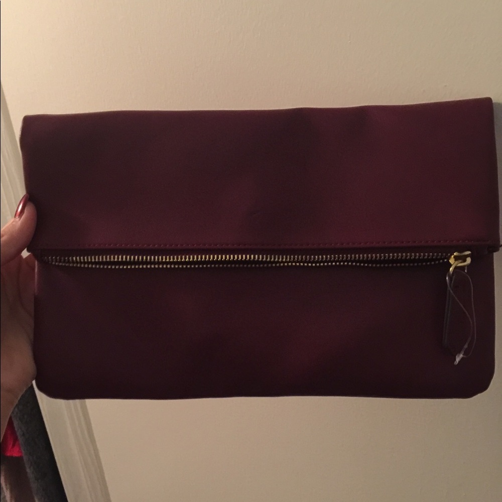 Maroon clutch! Magnetic.